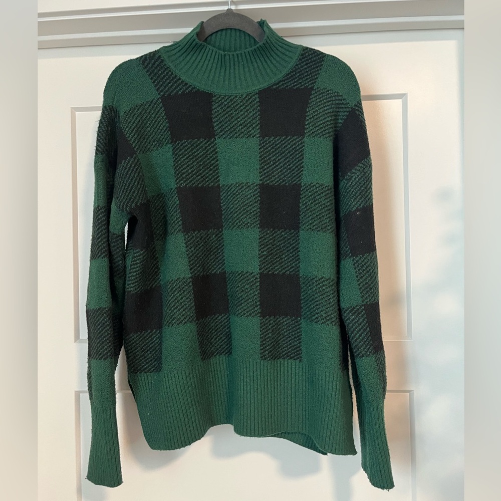 Green and black plaid sweater